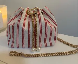 Striped Red and White Linen Bucket Bag thumbnail 1