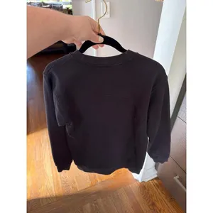 Lululemon Perfectly Oversized Crew Sweatshirt in black featuring a dark 2 thumbnail 4
