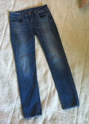 American Eagle distressed dark wash 0 skinny jeans thumbnail 1