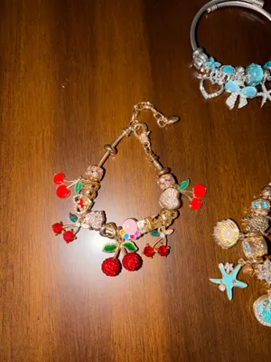 Set of 5 charm bracelets 4 gold 1 silver thumbnail 2