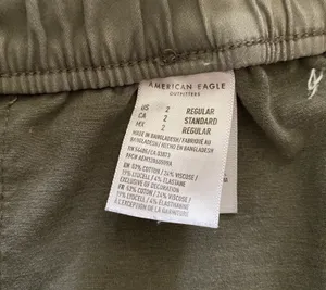 American Eagle -ARMY GREEN JOGGER PANTS-SIZE 2 Elastic waist with drawstring, zip front, two front and two back pockets, elastic ankles with a side zipper, excellent condition Measurements: Waist: side to side 13-16 inches Rise: 9 inches Inseam: 37 inches thumbnail 13