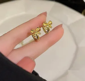 Gold Thick Mini Bow Hoops thumbnail 1
