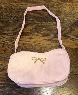 Pink Purse with gold bow detail thumbnail 1
