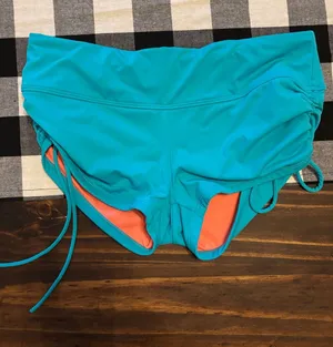 Athleta small teal blue ruched swim shorts thumbnail 1