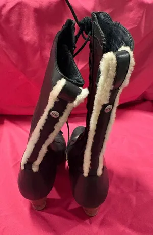 UGG Black Leather Heeled Lace-Up Boots with Cream Shearling Trim thumbnail 1