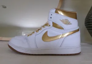 Nike Jordan Air 1 High OG Metallic Gold White Sneakers thumbnail 1