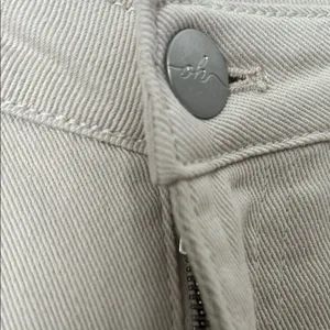Oh Polly Size US 2 Devyn Mid-Rise Flare Jeans in Ecru thumbnail 3
