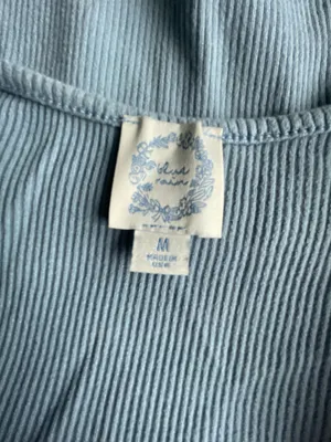 Francesca’s blue ribbed long sleeve top with corset style waist thumbnail 5