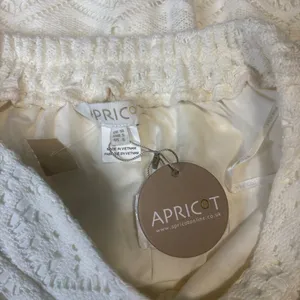NEW APRICOT crochet lace maxi skirt with split in off white thumbnail 5