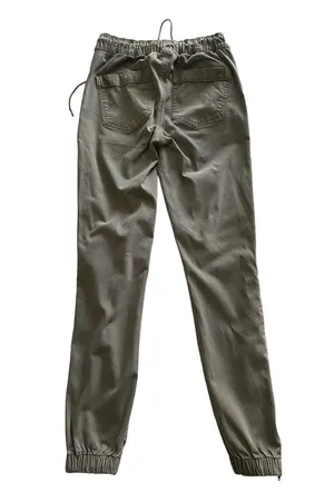 American Eagle -ARMY GREEN JOGGER PANTS-SIZE 2 Elastic waist with drawstring, zip front, two front and two back pockets, elastic ankles with a side zipper, excellent condition Measurements: Waist: side to side 13-16 inches Rise: 9 inches Inseam: 37 inches thumbnail 8