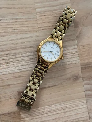 Seiko Vintage Watch Gold Bracelet Case White Dial Blue Gold Hands Date Window thumbnail 6