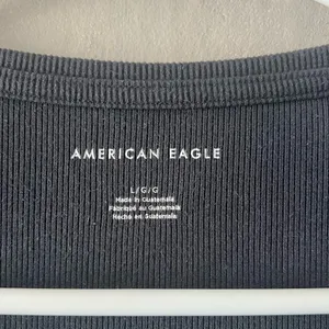 American Eagle Black Ribbed Short Sleeve Bodysuit Size Large thumbnail 3