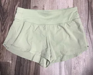 Calia by Carrie High-Rise Athletic Shorts in Sage Green thumbnail 1