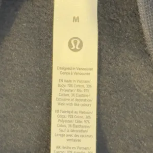 489 | NWT Lululemon Scuba High Rise Mini Skirt Black Soft Fleece‎ M thumbnail 7