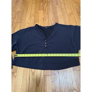 Alo Yoga Micro Waffle Pleasant Cropped Henley in Black thumbnail 6
