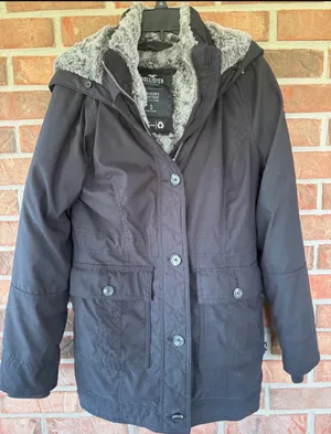Y2K Hollister Women's Navy Sherpa Lined Winter Jacket missing fur on hood thumbnail 1