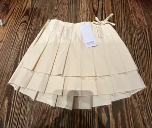 AKIRA NWT CREAM Pleated Mini Skirt thumbnail 1