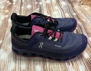 On | Cloudvista Waterproof Trail Running Shoe (Women) |10 Waterproof: protects against rain, puddles and slush to keep feet dry in wet conditions Trail: provides superior stability and traction on hills, uneven surfaces and changing terrain Lightweight: puts cushioning and performance underfoot with an emphasis on streamlined comfort Removable, cushioned insole allows for custom orthotics Helion™ superfoam cushioning delivers lightweight energy return even in hot and cold temperatures CloudTec® sole provides a smooth ride that moves naturally with each stride Missiongrip™ multidirectional lugs in the tread maintain superior grip on changing terrain Synthetic and textile upper/textile lining/rubber sole thumbnail 1