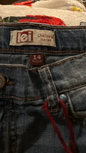 Stylish blue denim shorts with a trendy distressed look. Perfect for casual outings. thumbnail 3