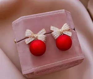 Gorgeous Holiday Bow with Red Shiny Ball Earrings thumbnail 1