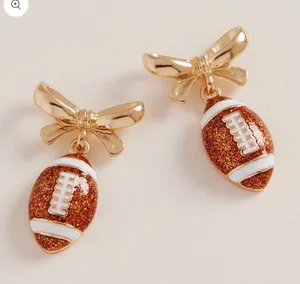 Bow Accent Football Dangle Earrings Gold thumbnail 1