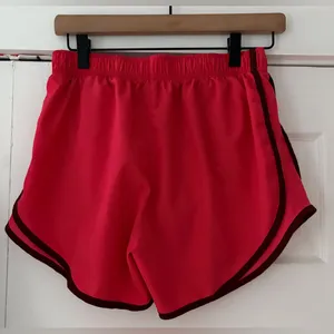 Nike Women's‎ Athletic Shorts in Red and Black Size Medium EUC thumbnail 2