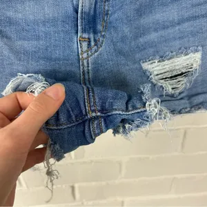 Levi’s Distressed High Rise Denim Shorts Size 28 thumbnail 7