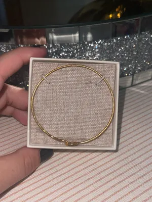 This is a Pura Vida bracelet featuring a dainty gold-tone wave charm thumbnail 5