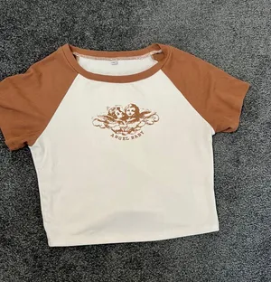 Amazon Angel baby tee thumbnail 1