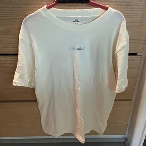 NWOT Urban Outfitters Ambiguous Cream Short Sleeve Tee Unisex size Medium thumbnail 4