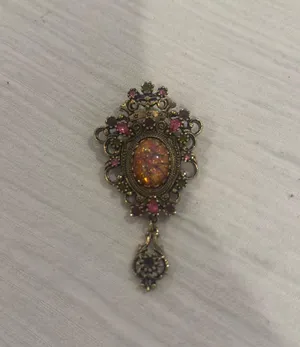 Coventry gold brooch thumbnail 1