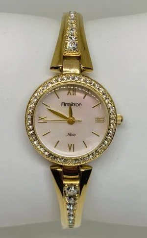 Armitron women’s watch gold tone 24mm mop dial quartz rhinestones running thumbnail 1