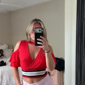 Red striped crop top with a cold shoulder cutout thumbnail 2