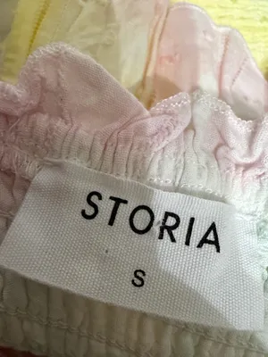 Storia Pastel Rainbow Skirt multi-tiered ruffled mini skirt - Size Medium .***Refer to measurements and sizes. Comfy & lightweight. Gently warn and excellent condition. Measurements approximately: 13” waste not fully stretched out from elastic x 14.5” long. Non-smoking home. Priced to sell at as is condition. Don’t like my price make reasonable offer. thumbnail 4