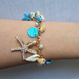 Ocean-Themed Charm Bracelet‎ with Blue and Gold Color Accents thumbnail 8