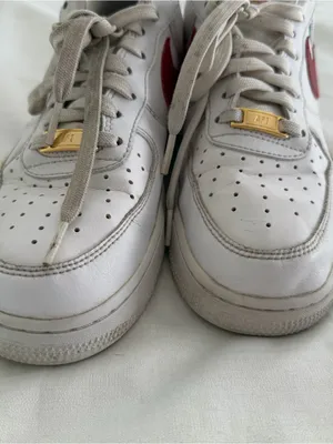 Nike Air Force 1s in white and gym red with gold accents size women’s 9.5 thumbnail 3