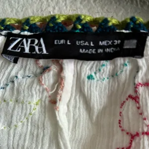 Zara Embroidered Tassel Tie Ivory Peasant Blouse L thumbnail 15