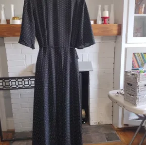 Lulu’s Farah Black Polka Dot Flutter Sleeve Midi Wrap Dress thumbnail 7