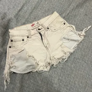 Levi's Women's Frayed Cream Jean Shorts thumbnail 1