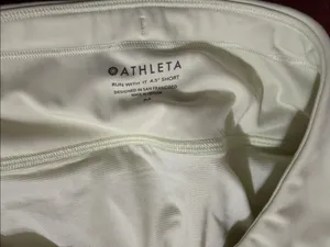 Athleta run with it shorts pastel lime green thumbnail 3