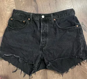 Levi’s black denim cut off shorts thumbnail 1
