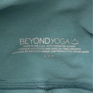 Beyond Yoga Caught in the Midi High Waisted Leggings in Deep Aqua 7/8 Length thumbnail 4