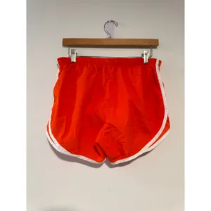 Nike Dri-FIT Tempo Running Shorts Women’s‎ Small Orange White Trim Athletic thumbnail 3