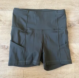 Lululemon High Rise Olive Green Biker Shorts with Pockets thumbnail 1
