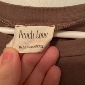 Peach Love California Women's Weekend Smiley Face Outline Puff Print Short Sleeve Garment Dyed Tee thumbnail 3