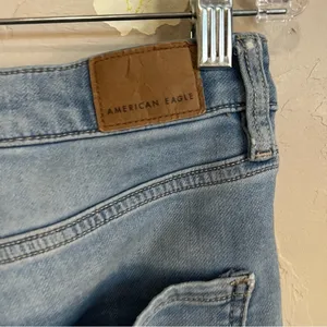 AEO Next Level Stretch Highest Rise Jegging‎ Crop Raw Hem Denim Jeans thumbnail 8