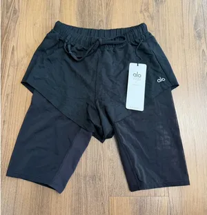 Aloha Island Alo Yoga Black Layered Mesh Lined Sunbathe Shorts‎ thumbnail 1