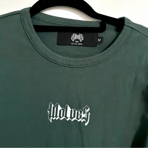 Darc Sport Infernal Flame Cropped Thermal Wolves long-sleeve top, Green | Medium thumbnail 3