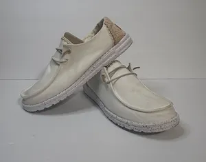 Hey Dude Women's Cream Slip-On Sneakers with Tan Heel Accent thumbnail 1