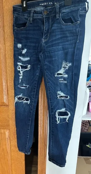 Like new!! American Eagle Outfitters Distressed Indigo Skinny Jeans thumbnail 1